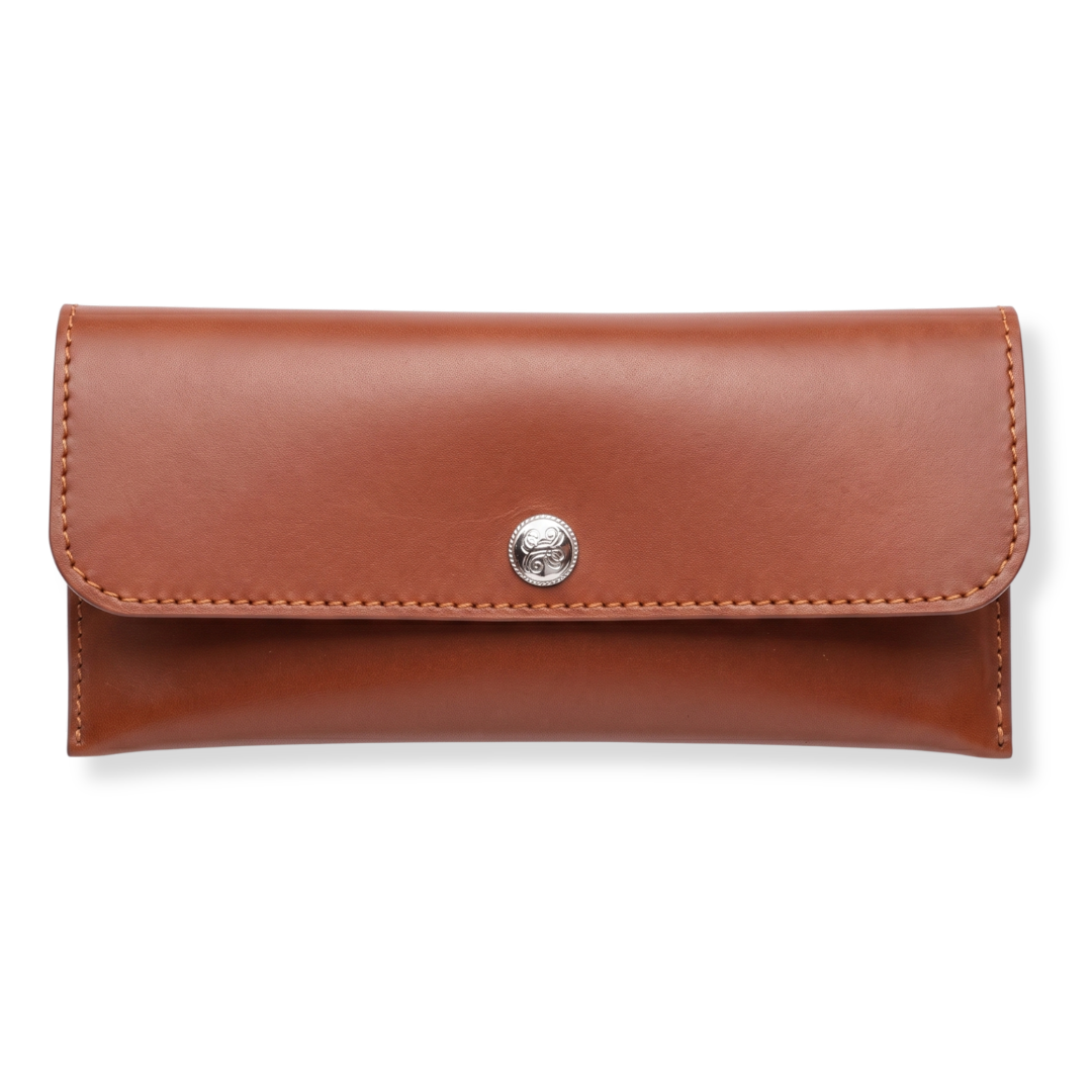 Brown leather slim clutch with a silver button clasp.