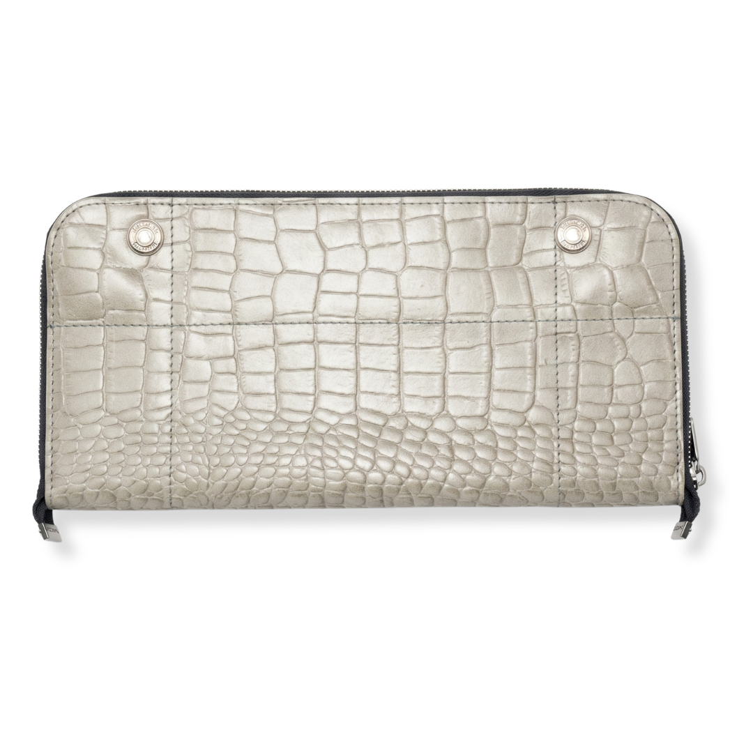 Elegant white travel utility tray with a textured crocodile skin pattern.